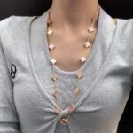 CLOVER 20 MOTIFS PINK MOP NECKLACE