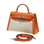 Her.mès Bag | Kelly Bag In Orange Leather And A Neutral Canvas Material